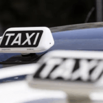 taxi roof sign installed on top of a car