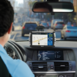 digitax x-one mobile data terminal installed inside a taxi operating in urban traffic