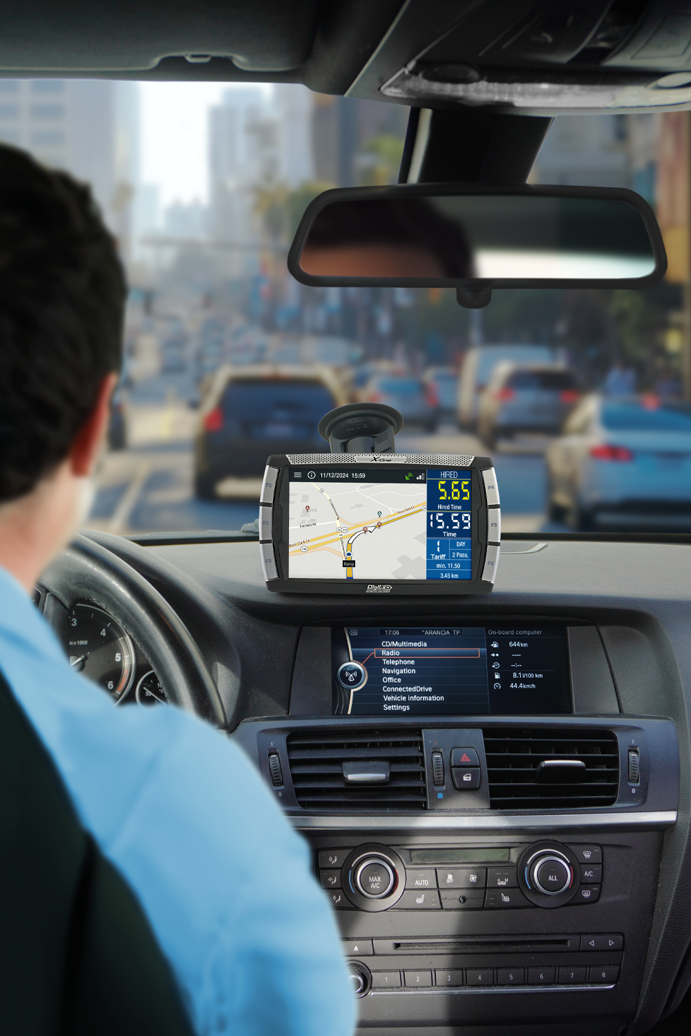 digitax x-one mobile data terminal installed inside a taxi operating in urban traffic