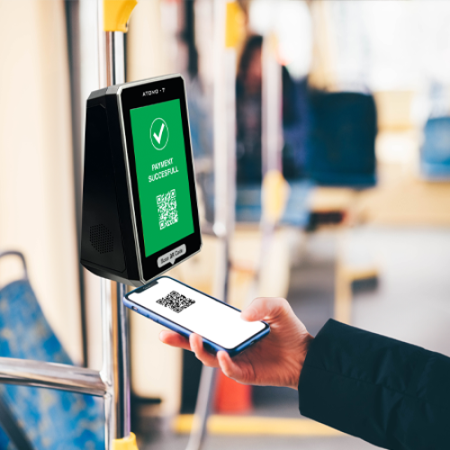 digitax atomo 7 open payment terminal on bus pole with passenger performing contactless payment